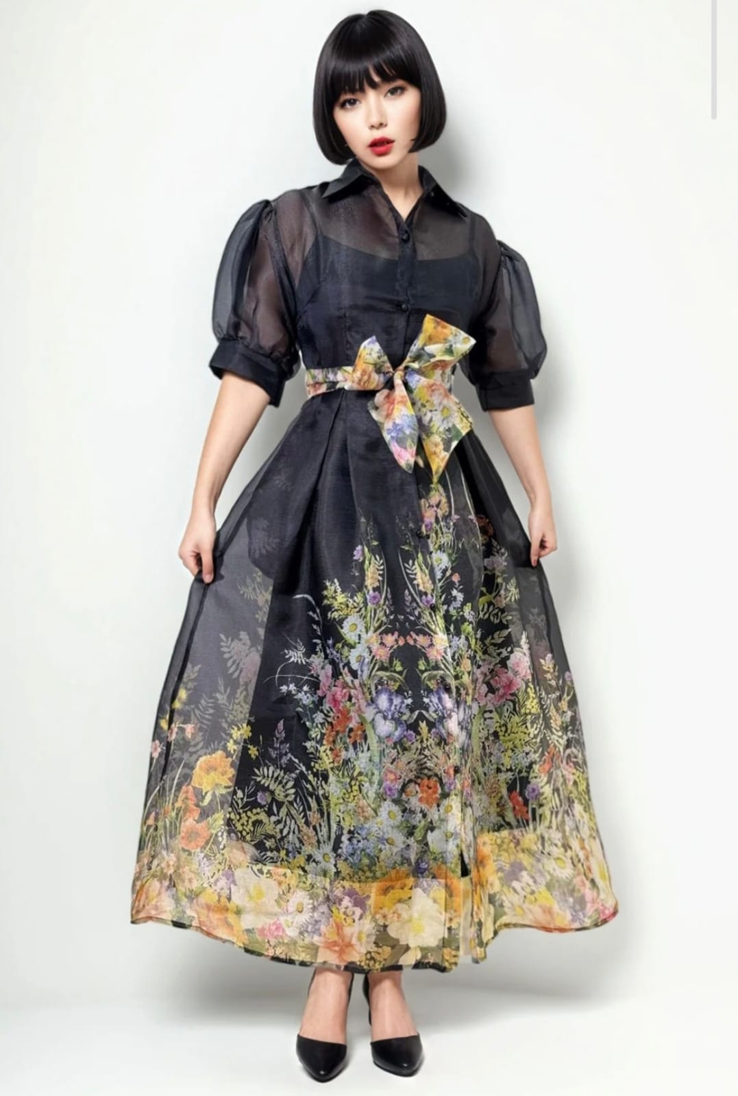 Woman wearing black shirt with floral skirt