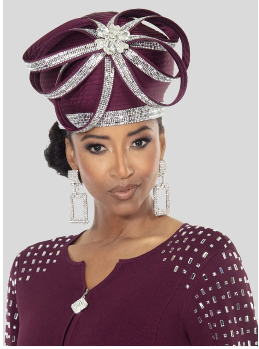 Woman wearing ornate burgundy rhinestone hat