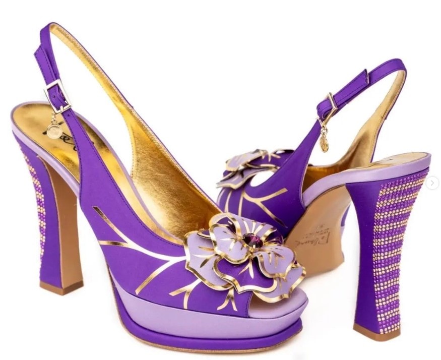 Purple heels with gold embellishments and bows