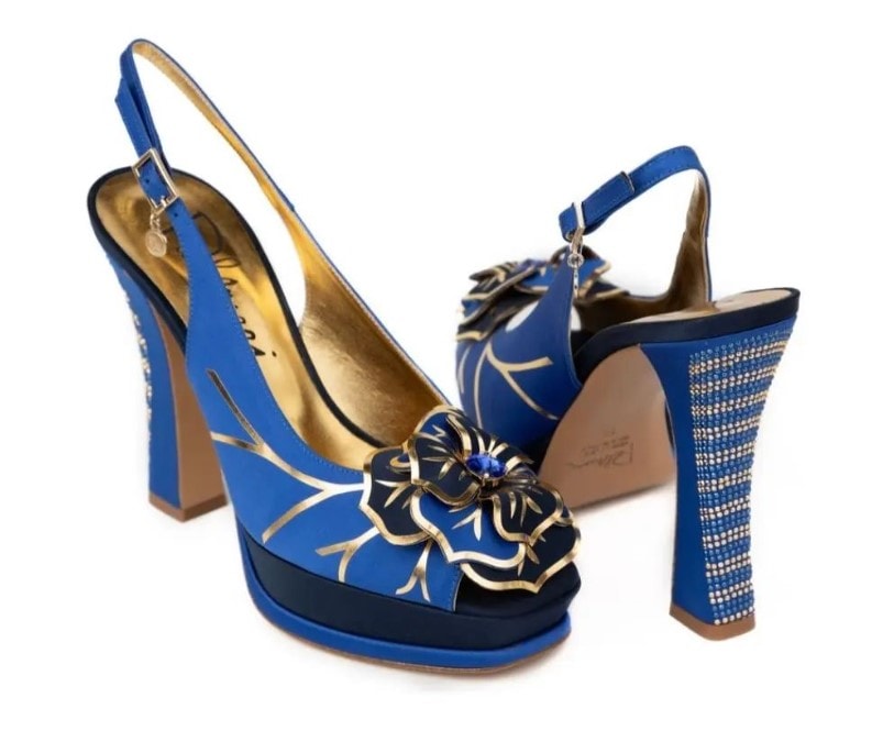 Blue embellished platform heels pair